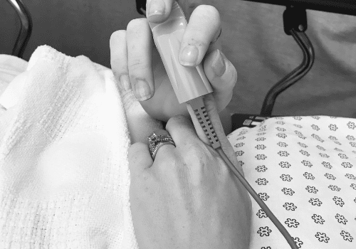 Woman in hospital bed