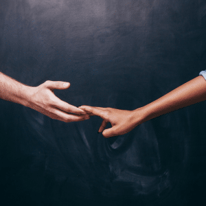 Partners reaching for each other